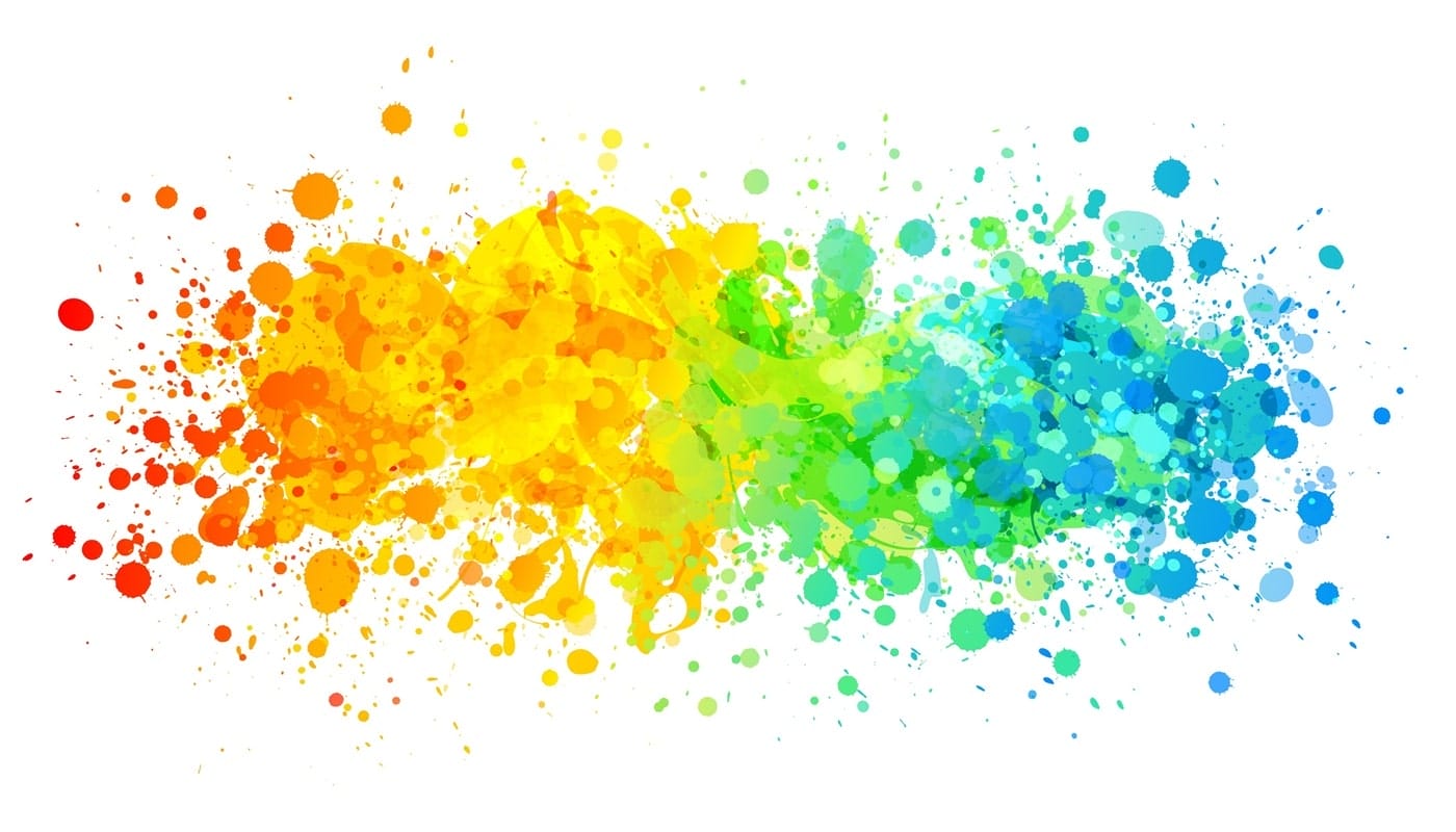 Bright, colorful paint drops on a plain background.
